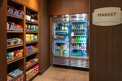 a refrigerator filled with lots of drinks in a store at Residence Inn Long Beach Downtown in Long Beach