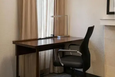 a desk with a chair in a hotel room at Residence Inn Pasadena Arcadia in Arcadia