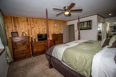 a bedroom with two beds and a ceiling fan at Majestic Pines Home in Big Bear Lake
