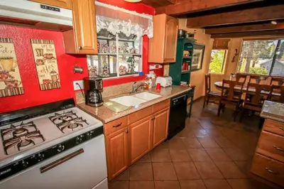 a kitchen with a stove and a sink at Family Fun House in Big Bear Lake