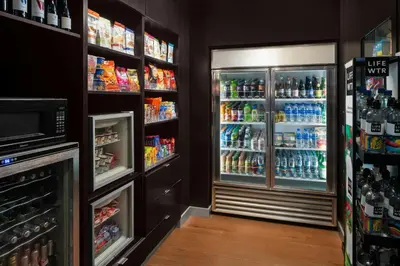 a refrigerator filled with lots of drinks at Courtyard Los Angeles Burbank Airport in Burbank