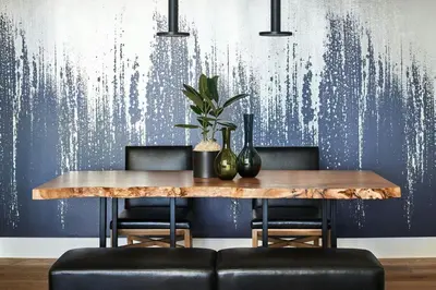 a dining room with a wooden table and chairs at Anaheim Marriott in Anaheim