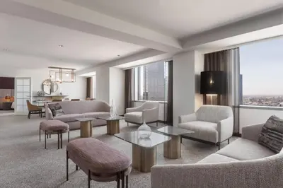a living room with a couch and a table at JW Marriott Los Angeles L.A. LIVE in Los Angeles