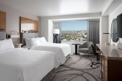 a hotel room with two beds and a window at JW Marriott Los Angeles L.A. LIVE in Los Angeles