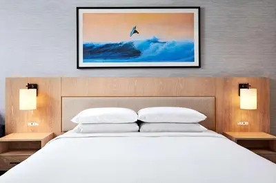 a bedroom with a bed and a picture on the wall at Hotel MDR Marina del Rey- a DoubleTree by Hilton in Los Angeles