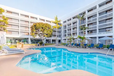 an image of a swimming pool in front of a building at Hotel MDR Marina del Rey- a DoubleTree by Hilton in Los Angeles