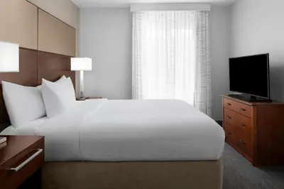 a hotel room with a bed and a television at Residence Inn by Marriott Santa Clarita Valencia in Santa Clarita