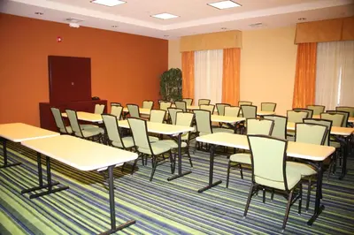 a classroom with tables and chairs in a room at Fairfield Inn & Suites Tehachapi in Tehachapi