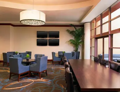 a conference room with a long table and chairs at Sheraton Agoura Hills Hotel in Agoura Hills