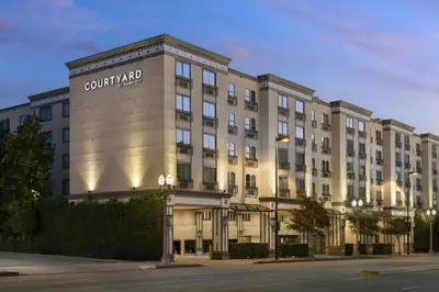 a building with a sign on the side of it at Courtyard by Marriott Los Angeles Pasadena Old Town in Pasadena