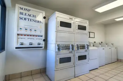 a laboratory with white appliances on a wall at Motel 6-Stanton, CA- Anaheim West in Stanton