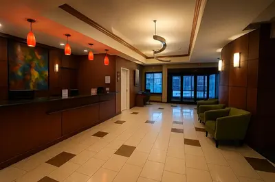 a hospital hallway with chairs and a waiting room at Best Western Hesperia-Victorville Suites in Hesperia