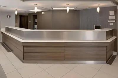 a lobby with a reception desk in a building at Residence Inn by Marriott Ontario Airport in Ontario