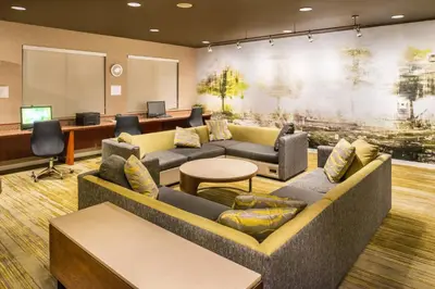 a lobby with a couch and a waiting room at Courtyard by Marriott Thousand Oaks Ventura County in Thousand Oaks