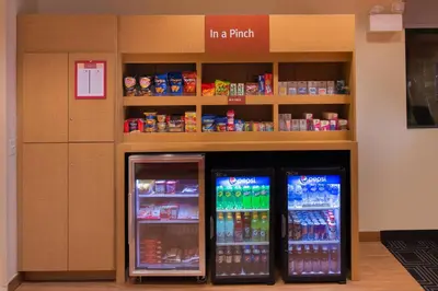 a store with two refrigerators in a grocery store at TownePlace Suites by Marriott Thousand Oaks Ventura County in Thousand Oaks