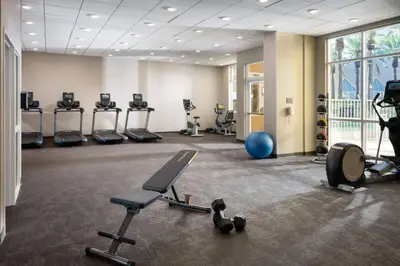 a gym with several exercise equipment in a room at Residence Inn by Marriott Anaheim Resort Area/Garden Grove in Anaheim