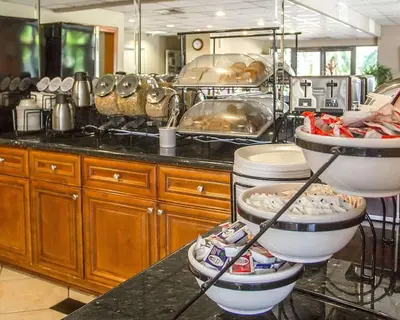 a kitchen with a counter with pots and pans at Quality Inn Riverside near UCR and Downtown in Riverside