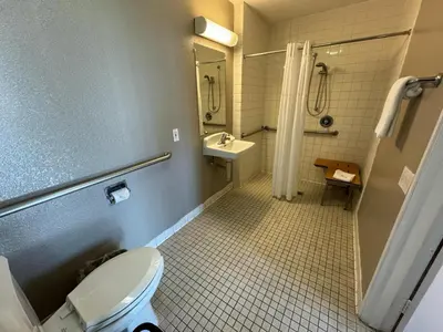 a bathroom with a toilet and a sink and a shower at Motel 6-Ventura, CA - South in Ventura
