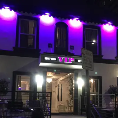 a building with purple lights on top of it at Hollywood VIP Hotel in Los Angeles