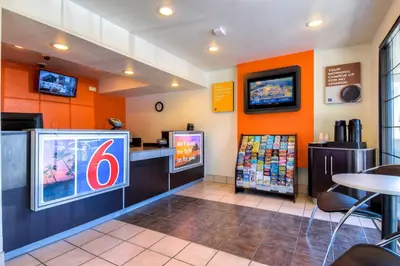 a fast food restaurant with orange walls at Motel 6-Pomona, CA - Los Angeles in Pomona
