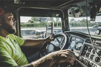 a man driving a truck at Studio 6 Bakersfield, CA South in Bakersfield