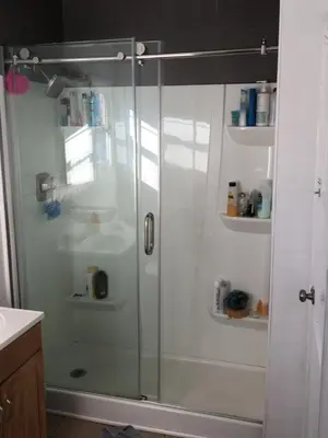 a shower with a glass door in a bathroom at Timen House in North Hollywood
