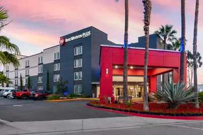 a hotel with a red and black building at Best Western Plus Commerce Hotel in Los Angeles
