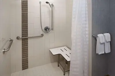 a bathroom with a sink and a shower at Hyatt Place Glendale/Los Angeles in Glendale