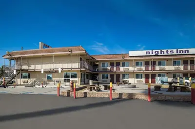 a hotel with a sign that reads nights inn at Rodeway Inn San Bernardino - Colton in San Bernardino