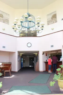 a chandelier hanging from the ceiling of a building at Ocean Gateway Inn in Santa Paula