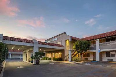 an empty parking lot in front of a hotel at SureStay Hotel by Best Western Camarillo in Camarillo