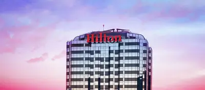 a building with a hilton sign on top of it at Hilton Los Angeles-Universal City in Los Angeles