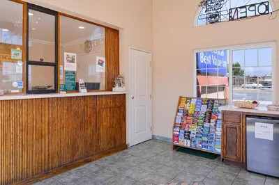 a restaurant with a cash counter in a store at Americas Best Value Inn-Rialto in Rialto