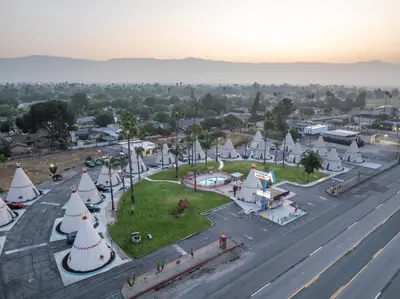 an aerial view of a town with white tents at Wigwam Motel in San Bernardino