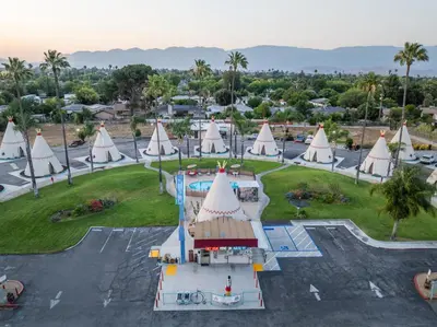 an aerial view of a resort with white tents at Wigwam Motel in San Bernardino