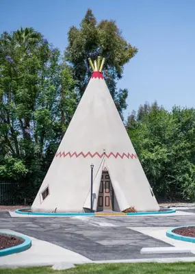 a teepee house in a park at Wigwam Motel in San Bernardino