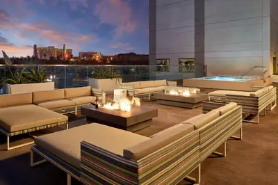 a rooftop patio with couches and a hot tub at Residence Inn by Marriott at Anaheim Resort/Convention Center in Anaheim