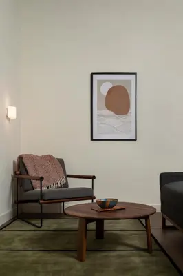 a living room with a couch and a coffee table at Hotel Marina Riviera in Big Bear Lake