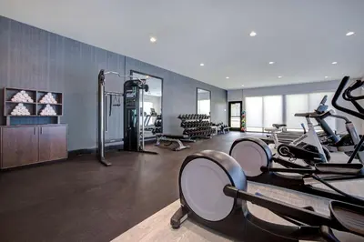 a gym with treadmills and cardio equipment in a room at Doubletree By Hilton Palmdale, Ca in Palmdale