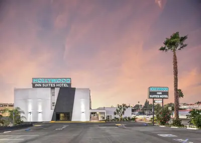 a rendering of a building with a palm tree at Hollywood Inn Suites Hotel in Los Angeles