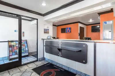 a fast food restaurant with a cash register and a counter at Motel 6 Riverside, CA - UCR East in Riverside