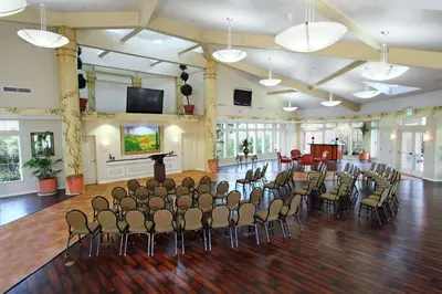 a large room with chairs and a stage in it at Hilton Garden Inn Oxnard/Camarillo in Oxnard