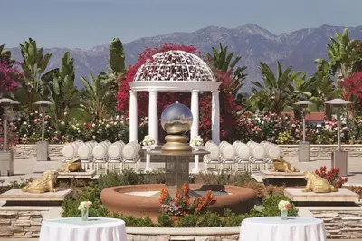 a garden with a fountain and a gazebo at Hilton Los Angeles/San Gabriel in San Gabriel