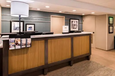 a lobby of a hospital with a reception counter at Hampton Inn Los Angeles-West Covina in West Covina