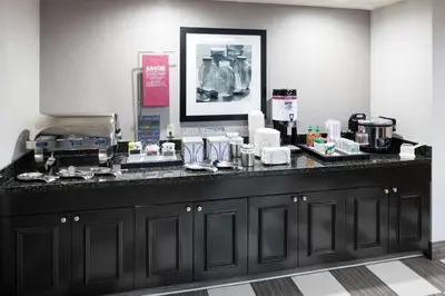a counter in a hotel room with aasteryasteryasteryasteryasteryasteryasteryastery at Hampton Inn Los Angeles Orange County Cypress in Cypress