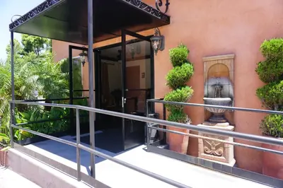a entrance to a building with plants in front of it at Casa Bella Inn Downtown LA in Los Angeles