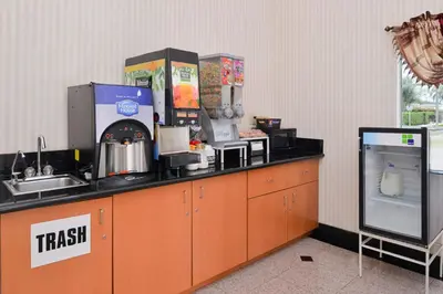 a kitchen with a counter with a coffee machine at Americas Best Value Inn - Azusa/Pasadena in Azusa