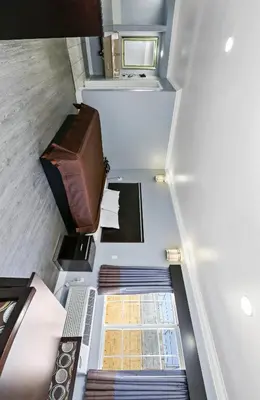 an overhead view of a staircase in a house at 3rd Avenue Inn in La Habra