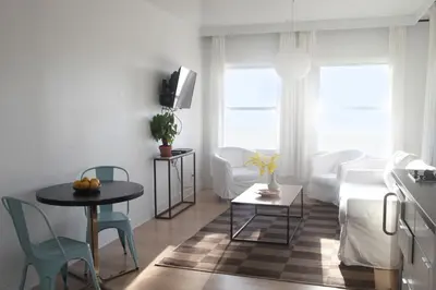 a living room with a couch and a table at Su Casa at Venice Beach in Los Angeles