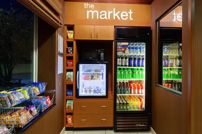 a grocery store with a refrigerator with drinks in it at Fairfield Inn & Suites - Los Angeles West Covina in West Covina